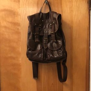Faux leather back pack style(small) bag.
